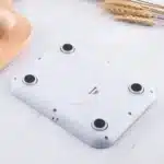 Base branca com detalhes para suporte de utensílios.